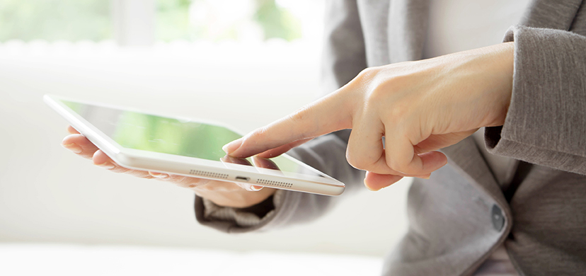Businesswoman,Holding,Tablet,In,Hands